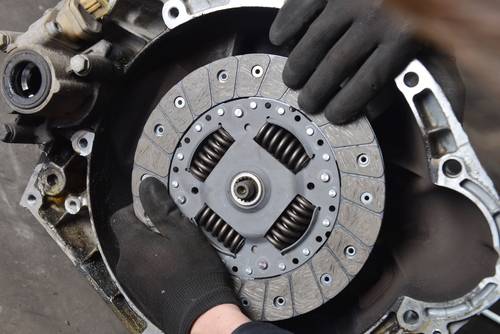 brake being installed onto a car